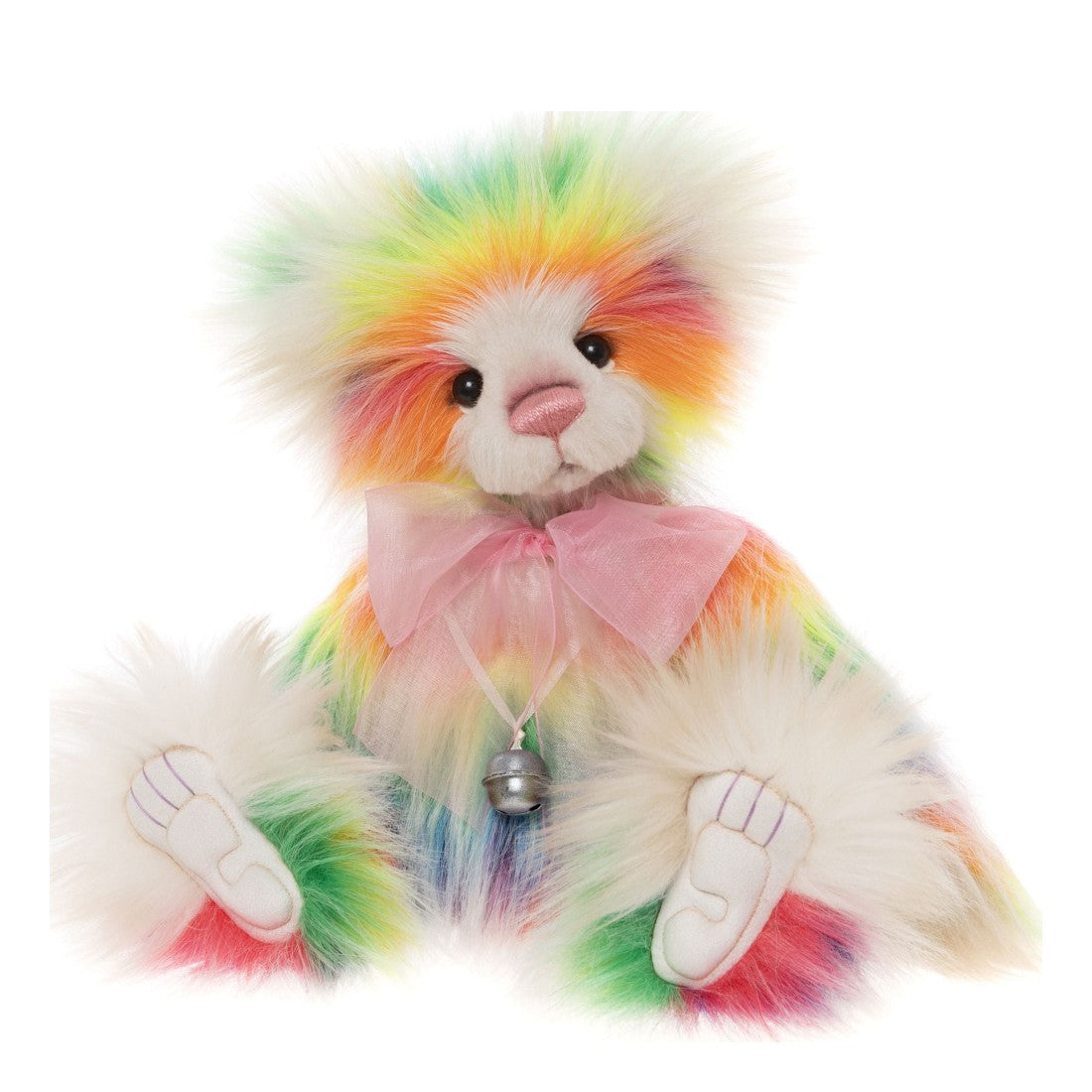 This is Rivendell by Charlie Bears. This fully jointed sitting bear has long, wispy, high-sheen fur that appears soft and slightly fluffy. The fur is multicolour concentrated around the head and limbs with prominent white fur on the muzzle, inner ears and surrounding the face; the inner ear tips show pale pink. The muzzle is white and rounded; the eyes are black and round; the nose is pink and rounded-triangular. Paw fronts and visible paw pads are pale white with purple stitched toe lines. Markings in...